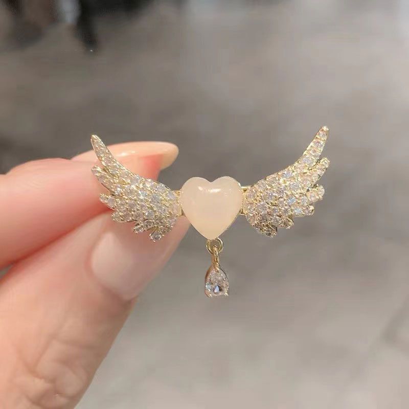 Celestial Wings: Heart & Angel Wing Brooch with Pearl Accents